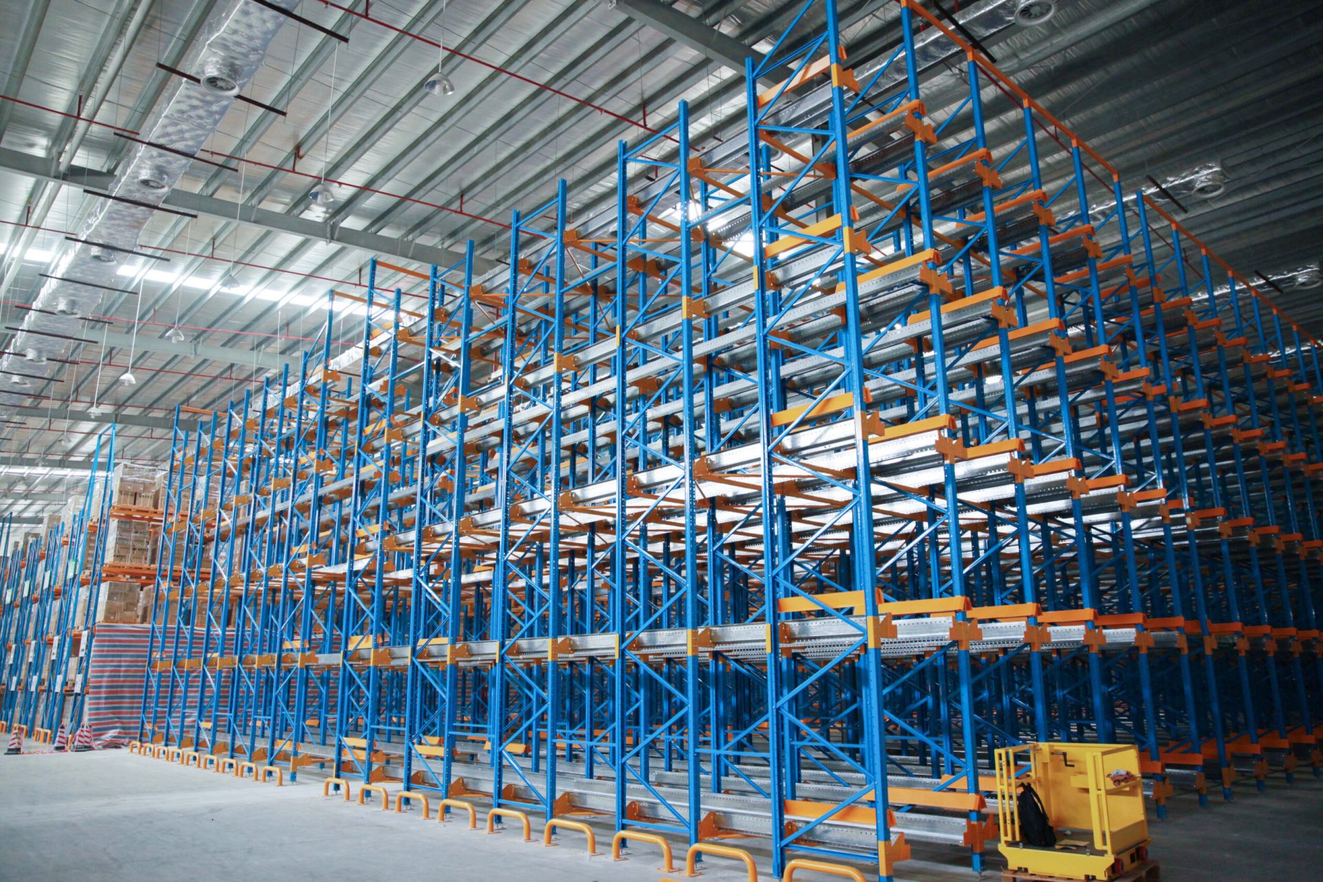 United Material Handling, Material Handling, Warehouse Logistics, Logistics, Warehousing, Automated Storage Solutions, ASRS, Pallet Shuttle, Robotics, Automation, Stacker Crane